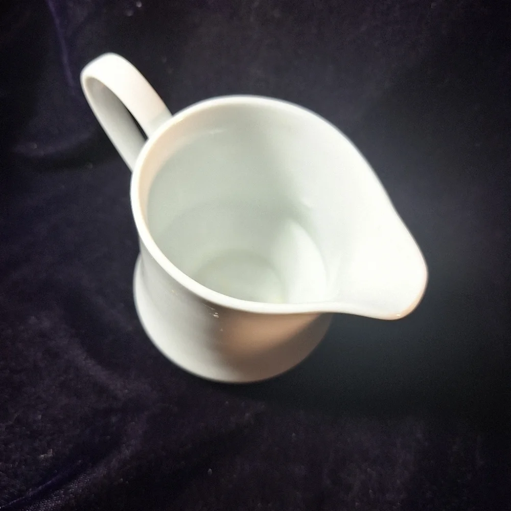 White porcelain creamer